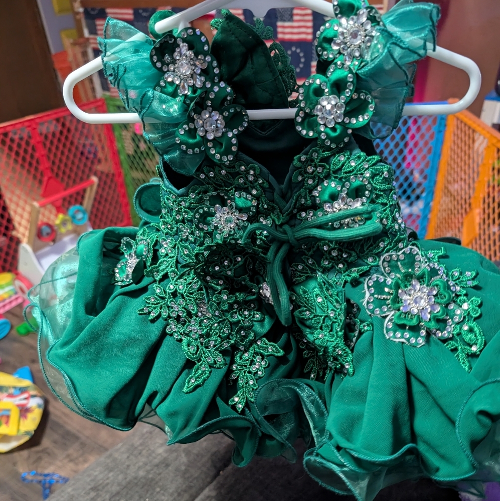 Green Formal Dress with Ruffled Skirt and Sequin Embellishments
